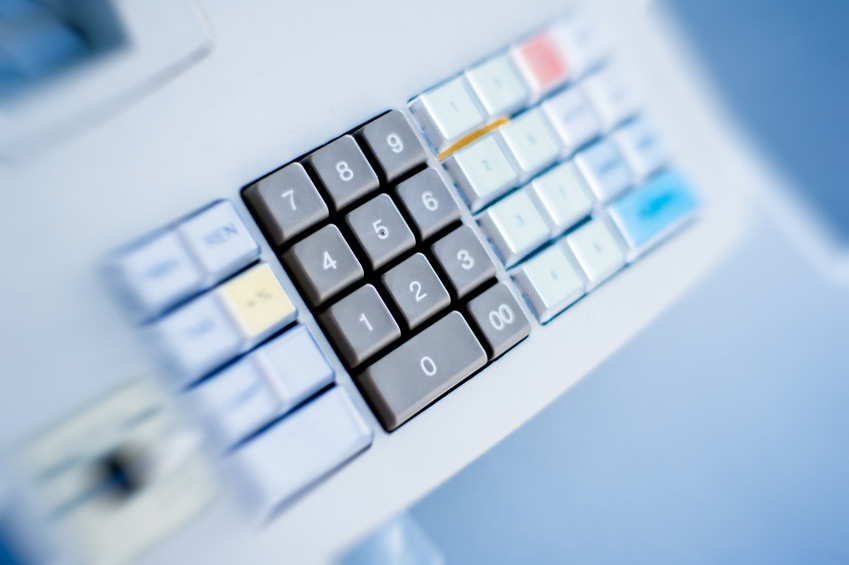 Cash register buttons on blue background